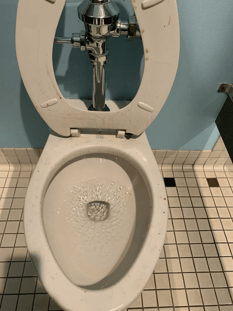 Commercial restroom before professional cleaning