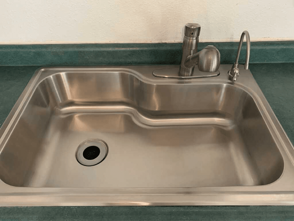 Sparkling clean kitchen sink after Fresh Cleaning Place